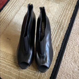 Lightly worn black booties